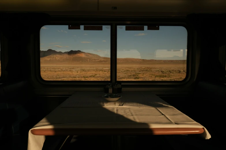 a bench and table in the front of a van