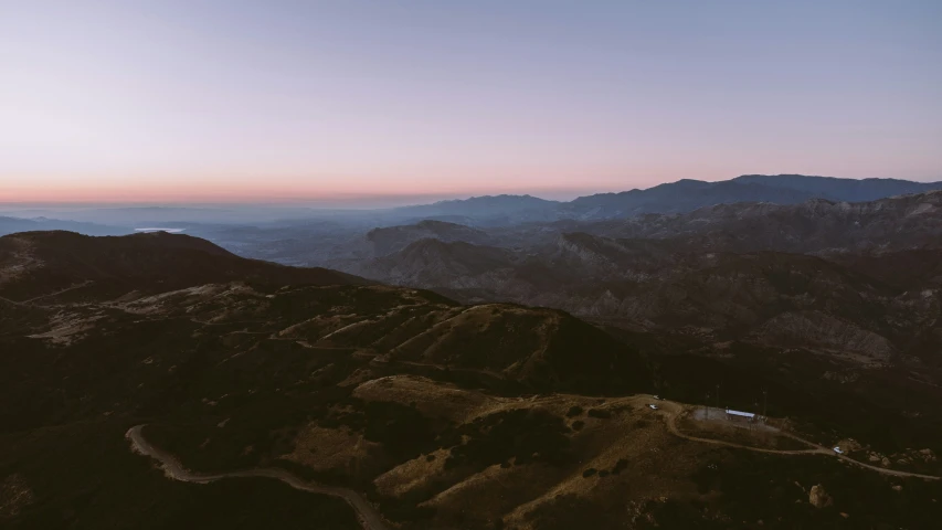 the mountains are brown with no trees on them