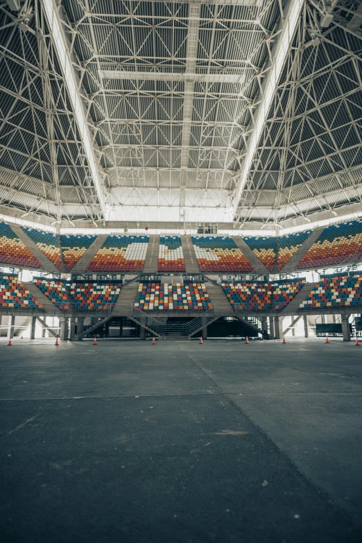 a large building with some sort of roof that is inside