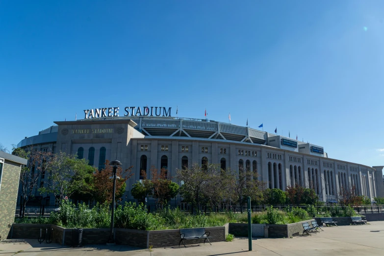 the exterior of a stadium with an outside seating area