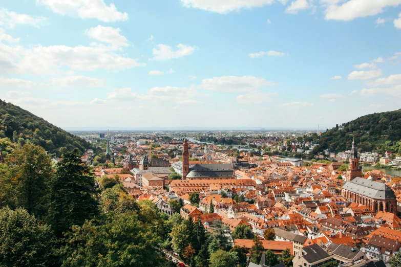 a view of a town from the top of a hill