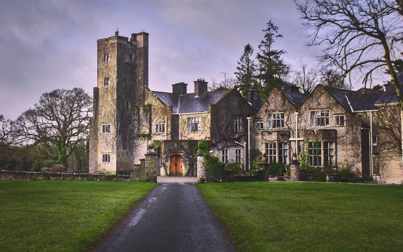 a large house with a driveway in front of it