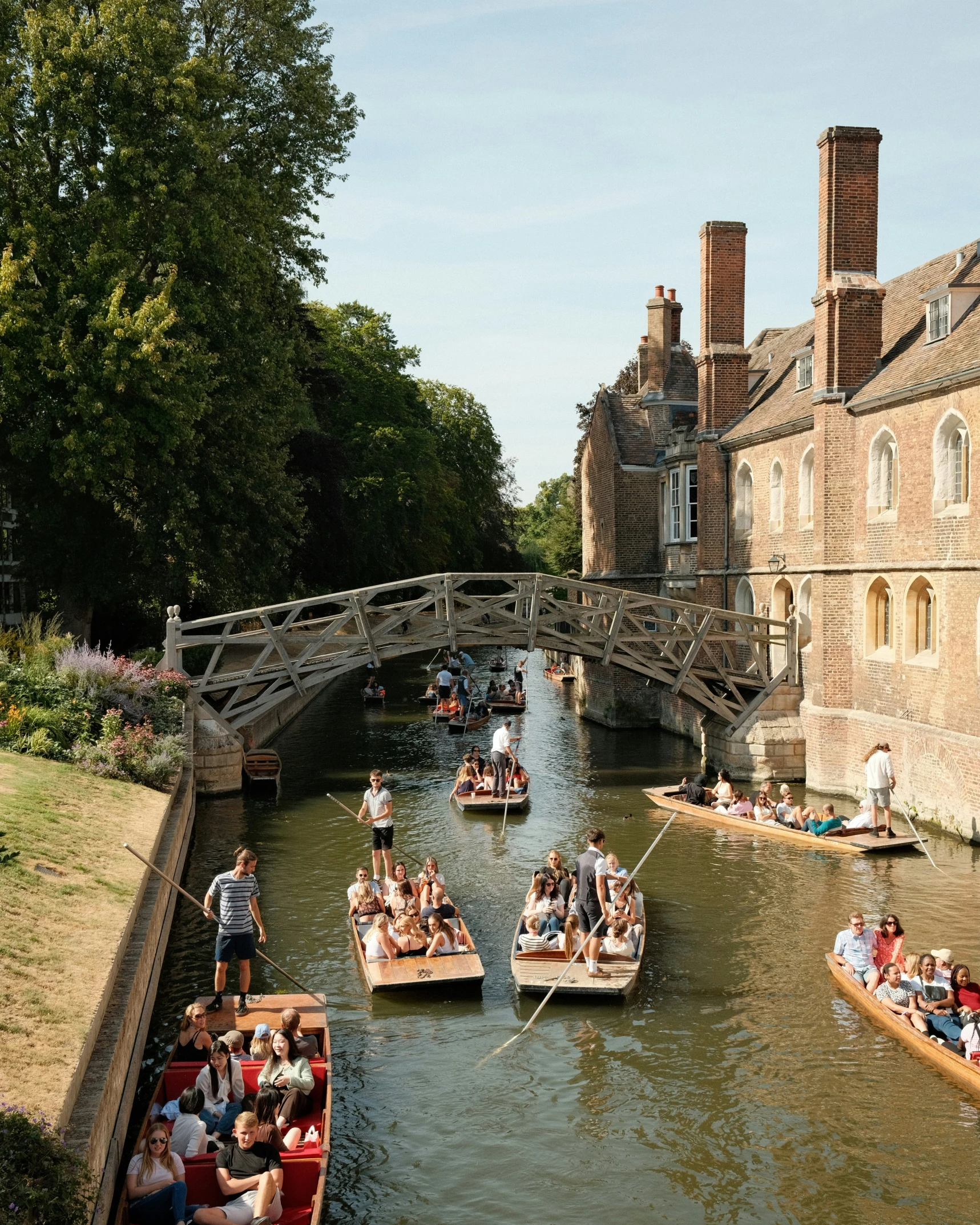 tourists are travelling down the canal to get to a destination