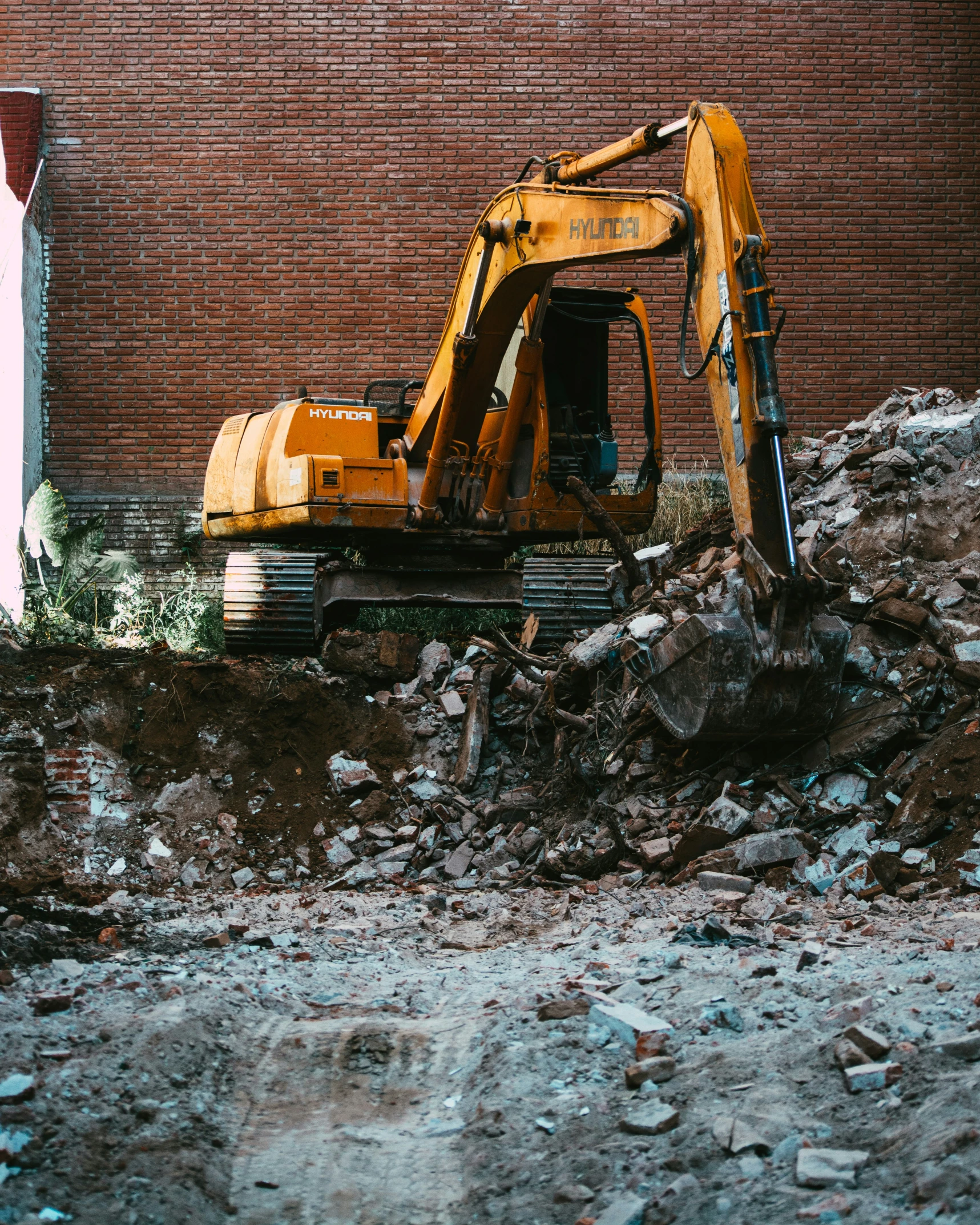 a construction vehicle is sitting in the dirt