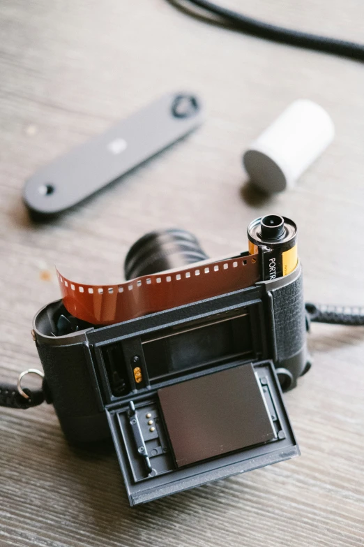 an analog video recorder, and a knife on a table