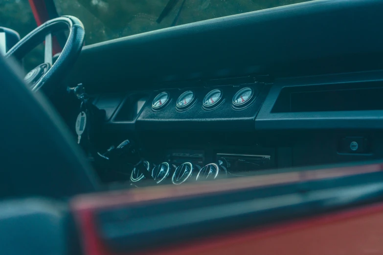dashboard and dash lights in a car at the rear end