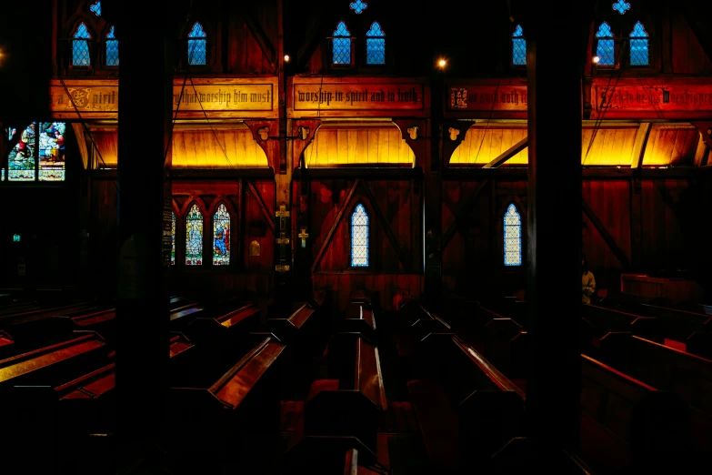 the dark image is of stained glass windows in this church