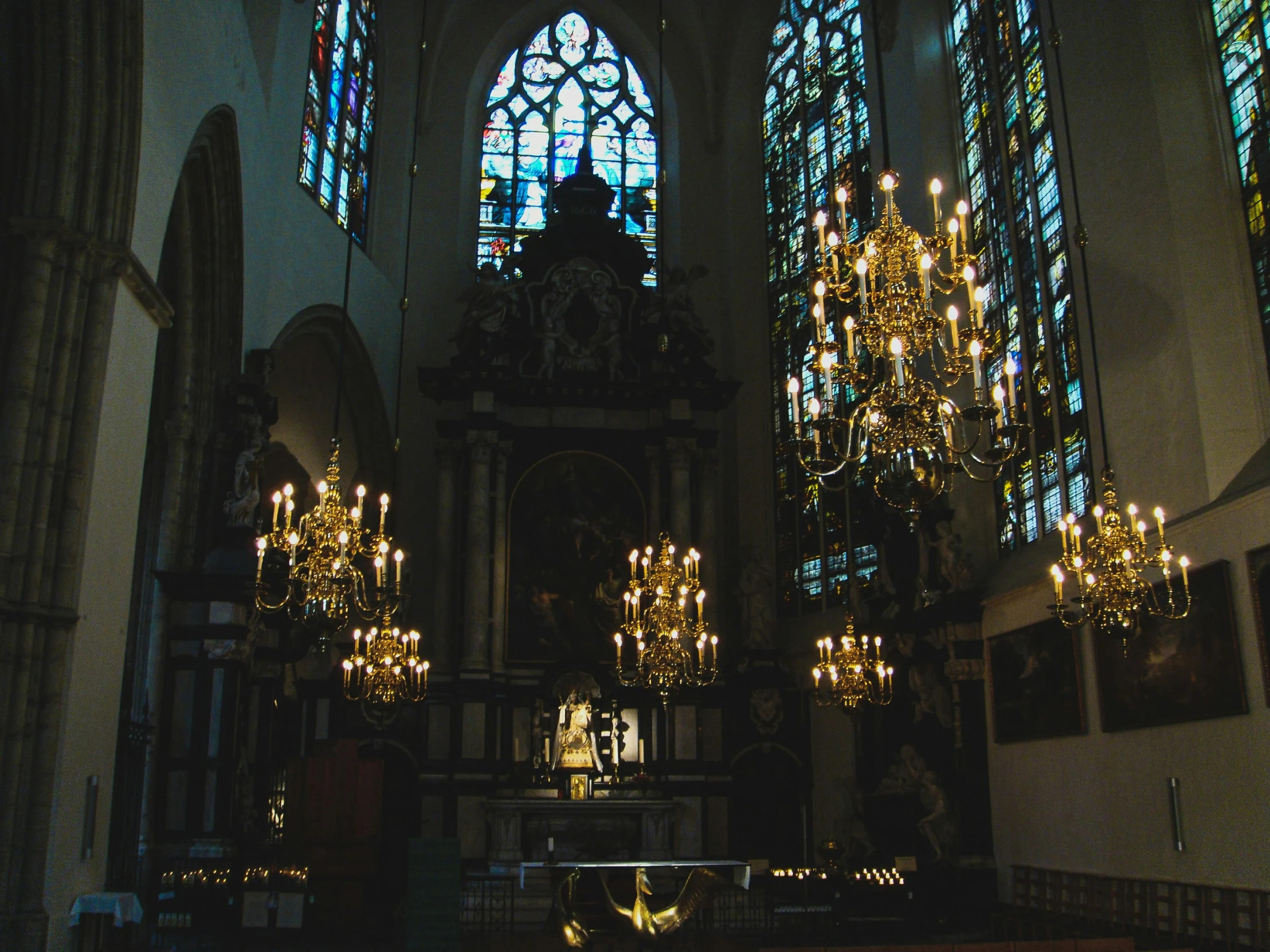 a church with many chandeliers on it