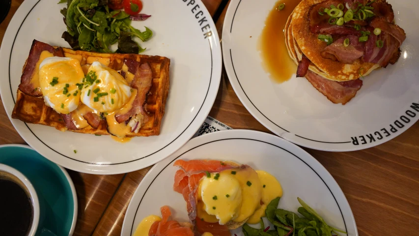 three plates with different types of food on them