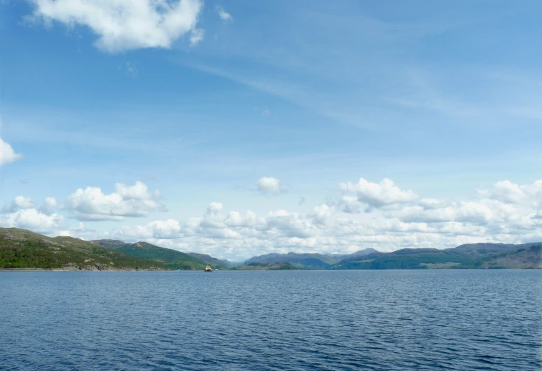 the view of mountains across a large body of water