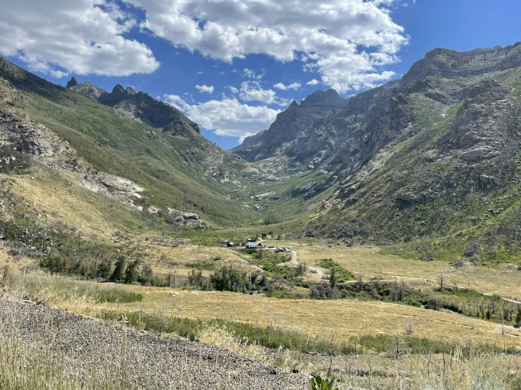 there is a mountain with a valley below