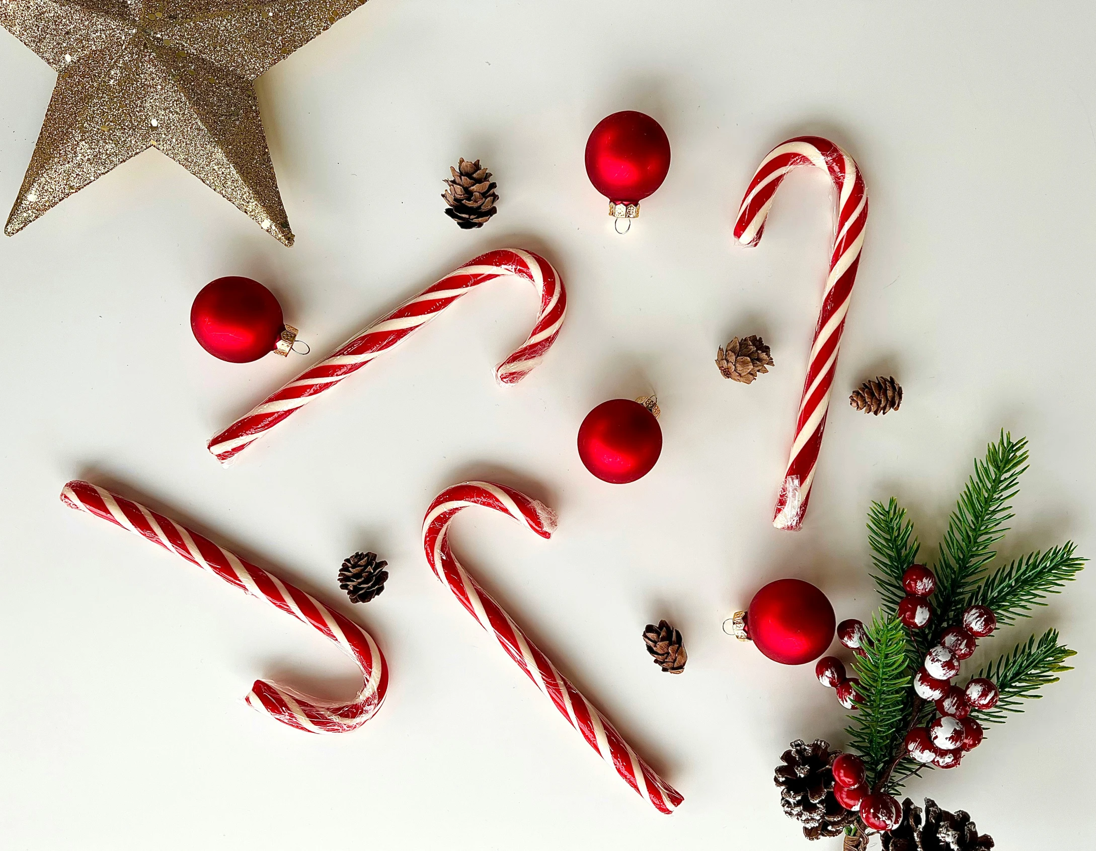 christmas decorations and stars on white background