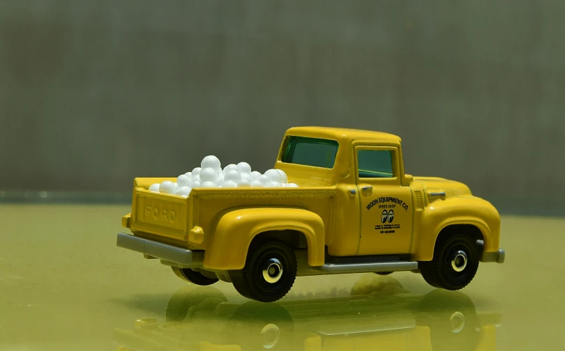 an antique truck with plastic bubbles in it