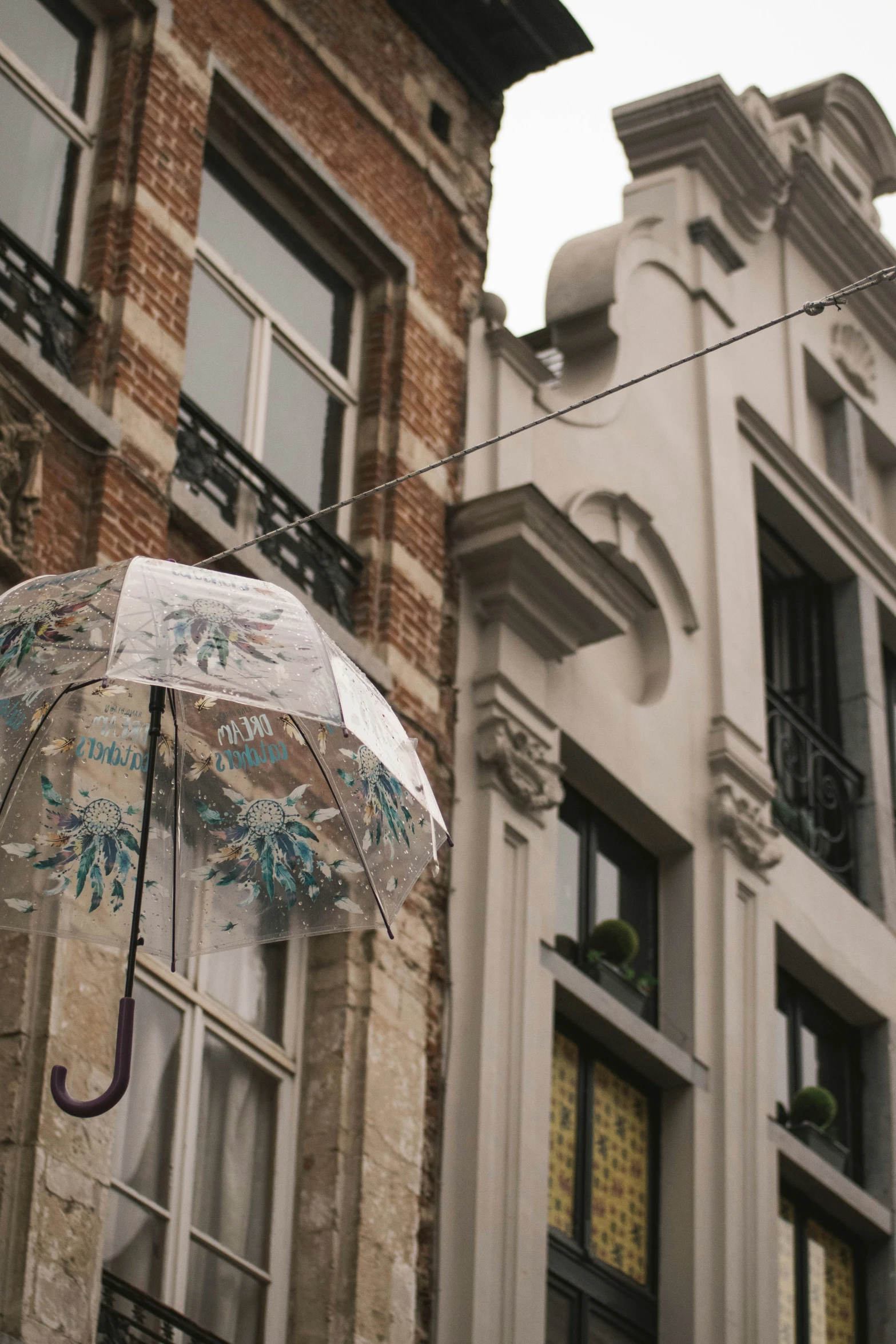 there is an umbrella in front of a building