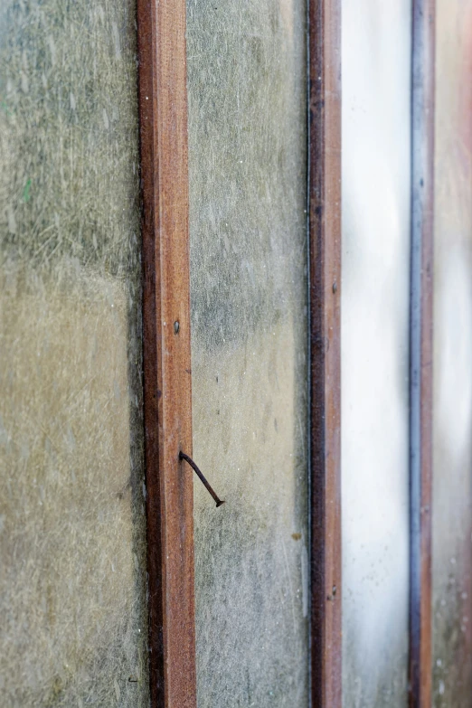 small window with a wooden frame in an old building