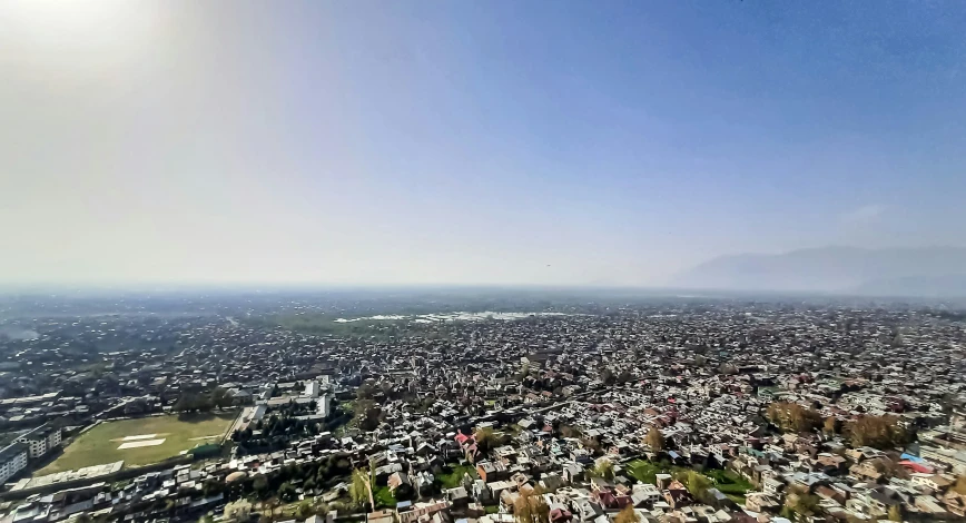 an aerial view of a large city in the distance