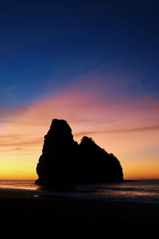 a couple of big rocks out in the ocean