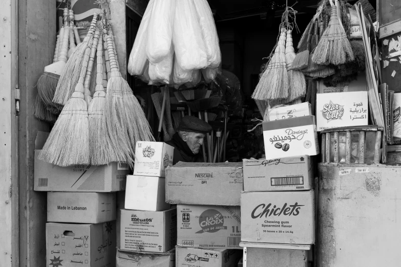 crates, containers, and hats stacked outside a store