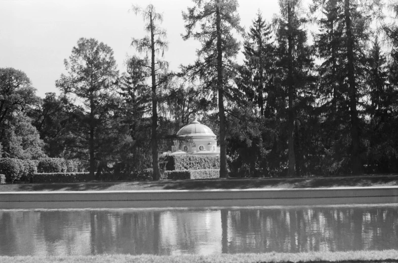 black and white po of a pavilion by a pond