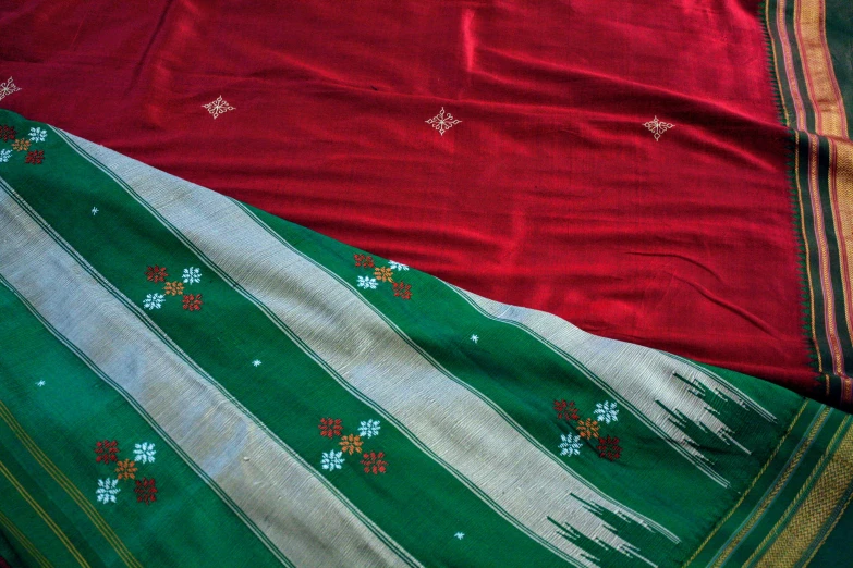 three colors of a green, red and white scarf