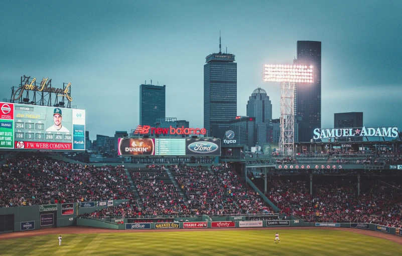 a large stadium is full with people and lights