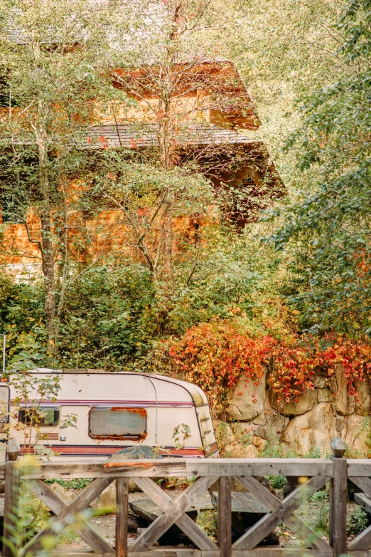 a bus that is sitting in the dirt