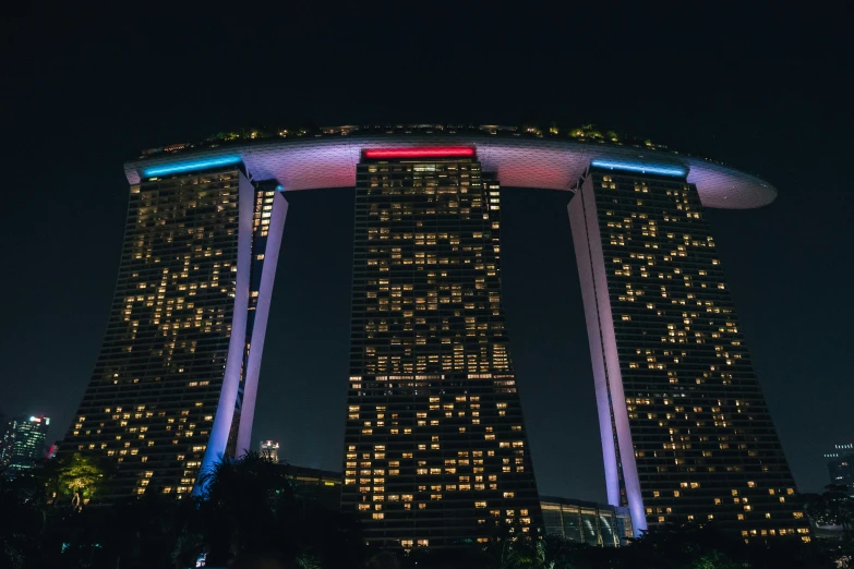 a view of the singapore skyscr in night