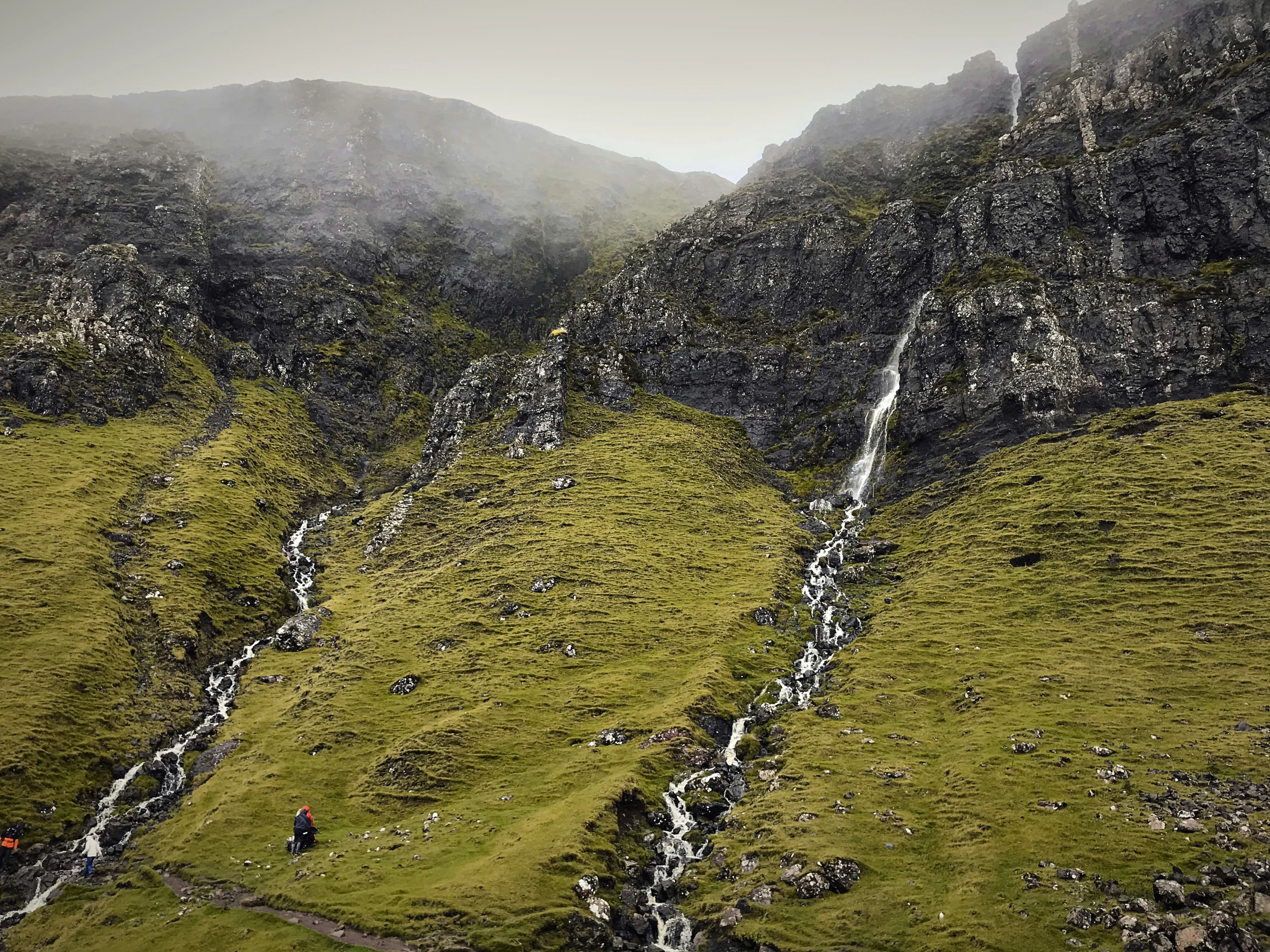 an aerial view of a rocky mountain in the wilderness