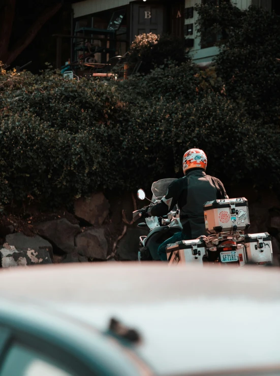 two men on motorcycles riding past each other