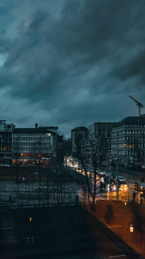 the lights of a street and skyscrs are shown