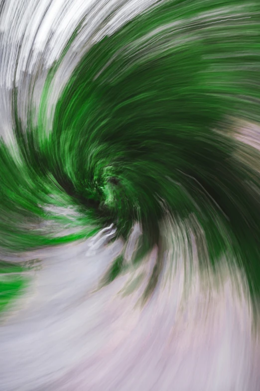 an abstract picture of green and white swirl