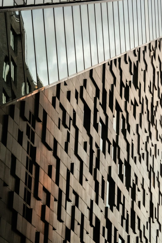 a building with the sky reflected in it