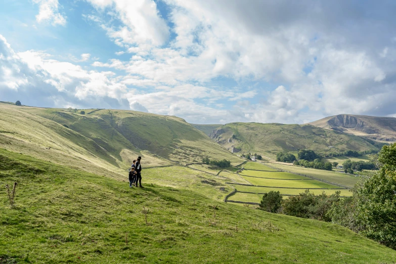 the man is doing his best tricks at a hill side