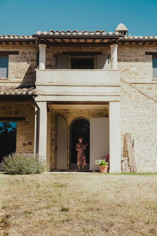 a person is opening the front of a house