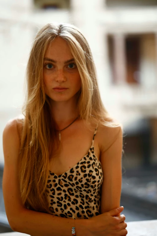 a pretty young lady with long blond hair