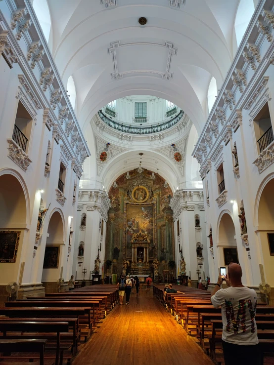 the inside of a church with high ceilings