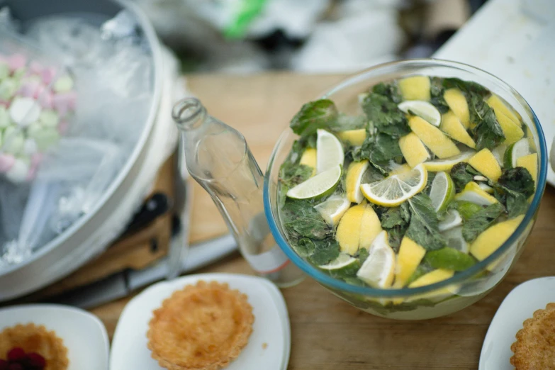 lemons, spinach and other vegetables on plates