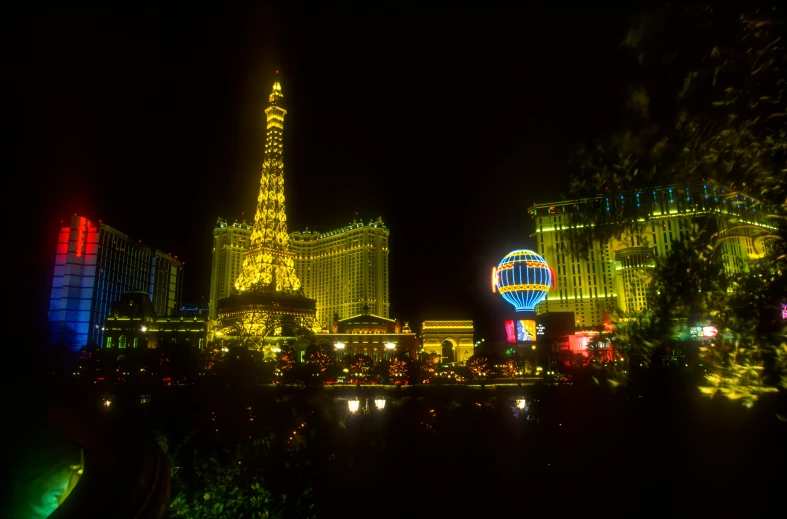 las vegas lights at night with a view of the fountains