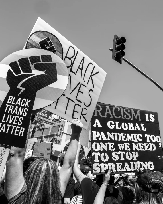people protesting against racism and racism in the us