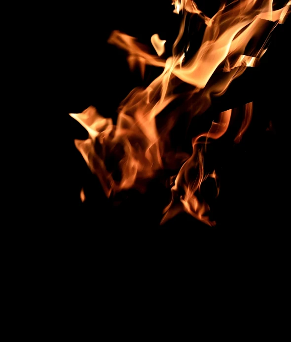 flames are burning in the black background