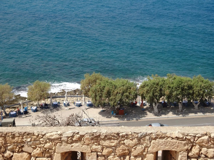 an aerial view of an beach area near the water