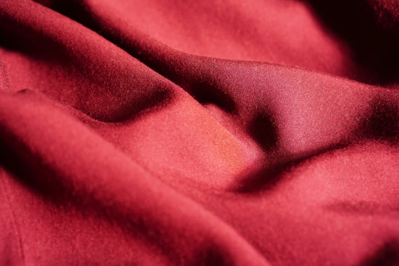 a plain red fabric is in the picture