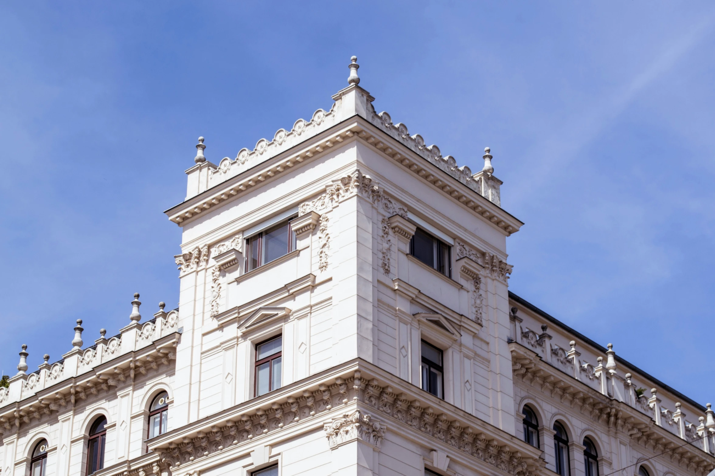 large white building with lots of windows on top