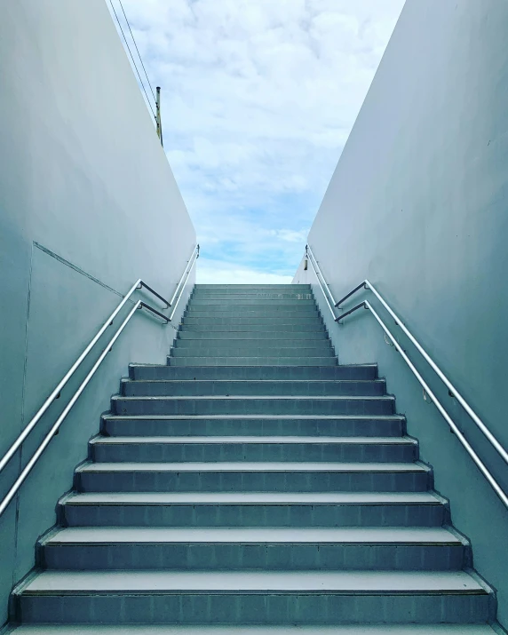 staircase up to a roof at the top of a building