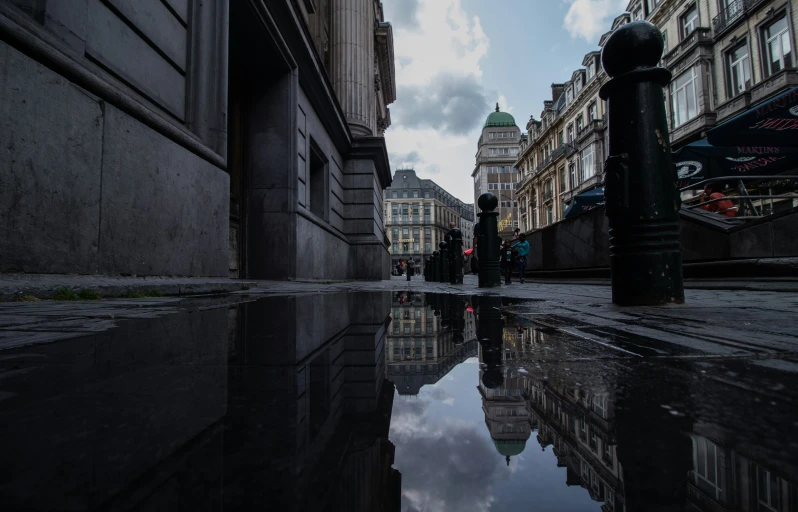 some very pretty buildings and some water reflecting them