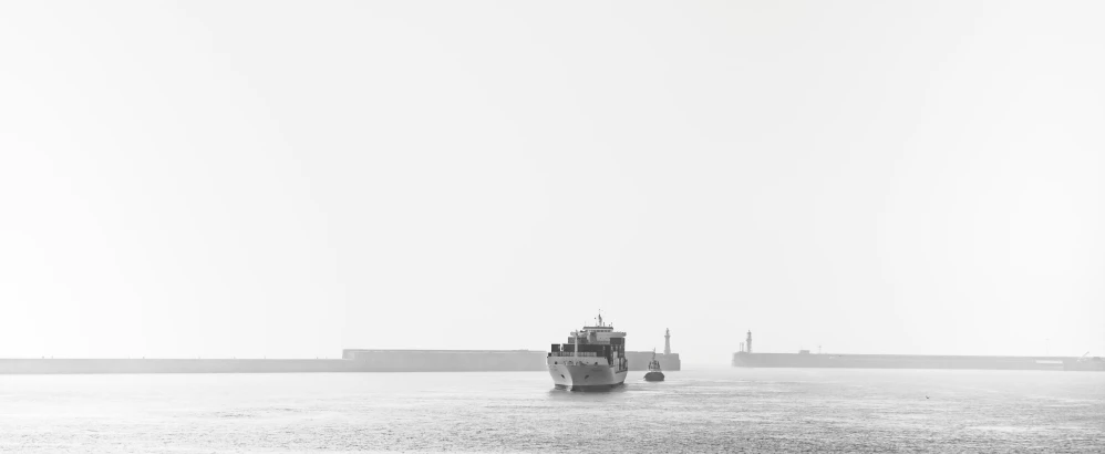 the large boat is floating on the water