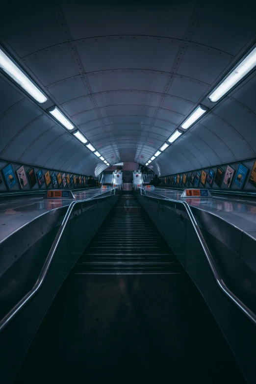 an empty airport filled with people and escalator