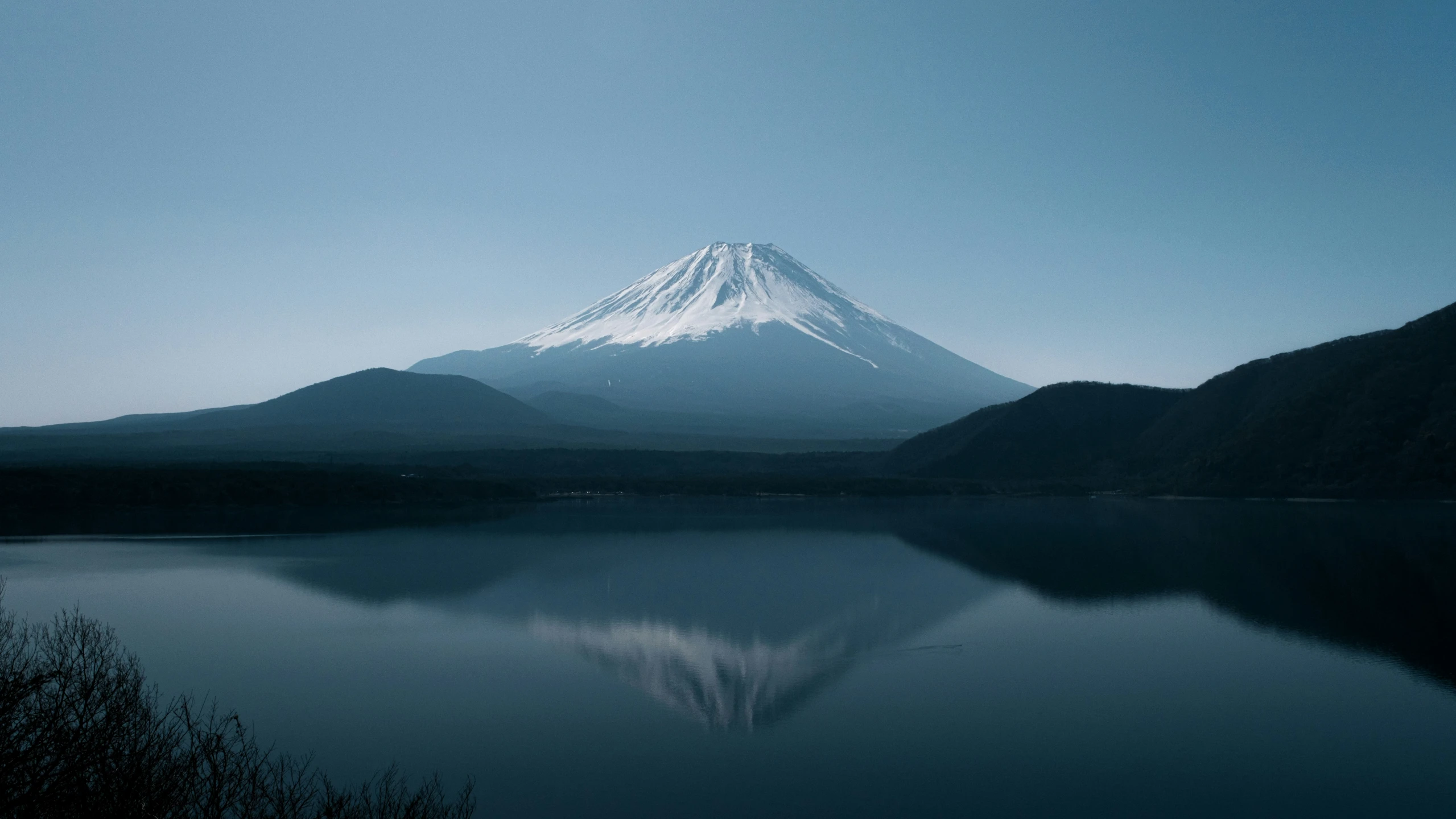 a beautiful mountain and lake in the evening