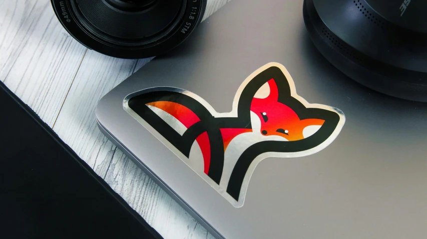 sticker of a fox on top of a camera