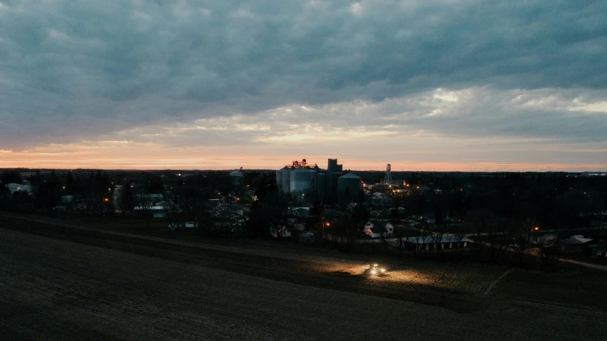 city lights as the sun sets over a city